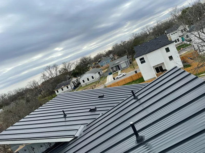 Standing seam metal roof panels with vents for Skylight Repair in Harwinton